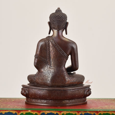 Back view of Amitabha Buddha Idol sacred copper alloy statue displaying traditional sculptural detailing and sacred design