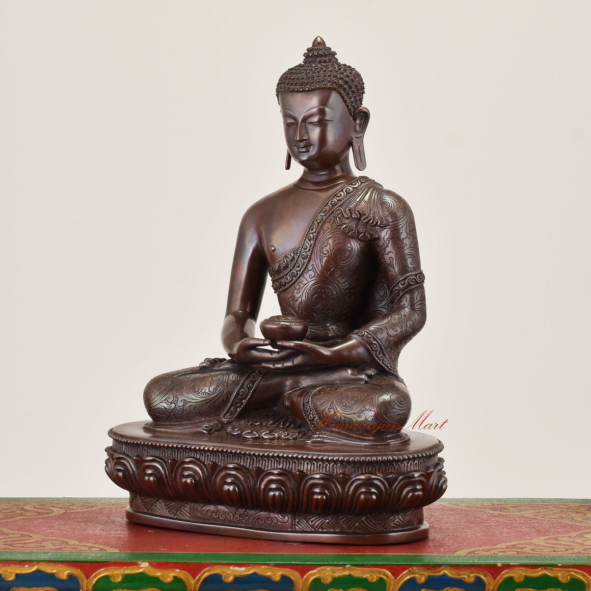 Left-side view of Amitabha Buddha Idol sacred copper alloy statue highlighting detailed robe work and balanced form
