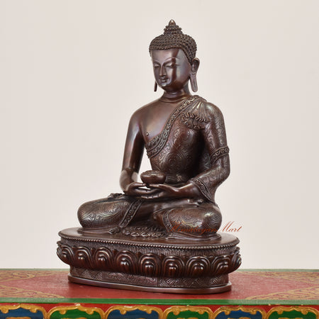 Left-side view of Amitabha Buddha Idol sacred copper alloy statue highlighting detailed robe work and balanced form