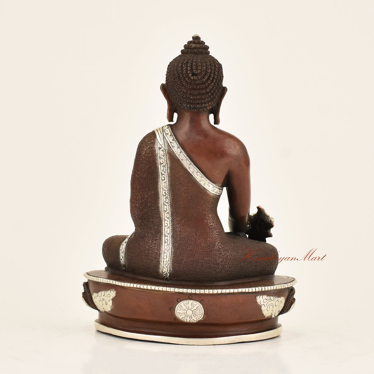 Back view of Antique Medicine Buddha Statue crafted using the traditional Lost-Wax Method