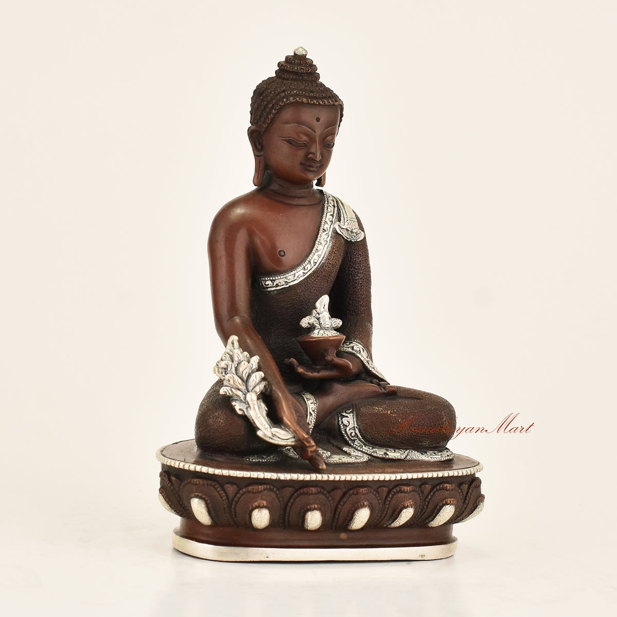 Right side view of Antique Medicine Buddha Statue in copper alloy with oxidized finish