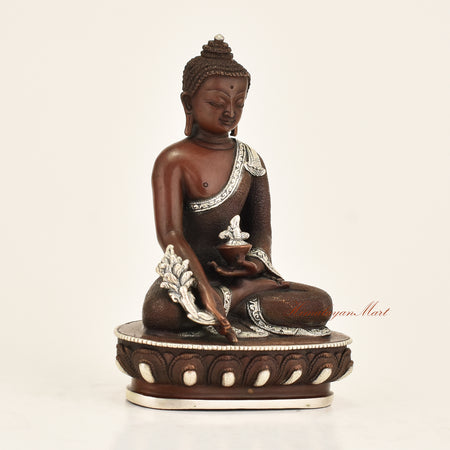 Right side view of Antique Medicine Buddha Statue in copper alloy with oxidized finish