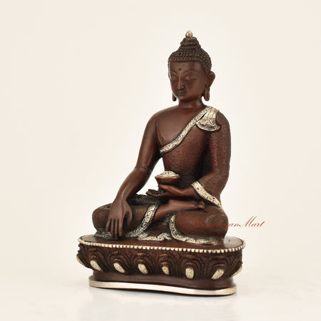 Left side view of Antique Shakyamuni Buddha Statue showing hand-carved detail