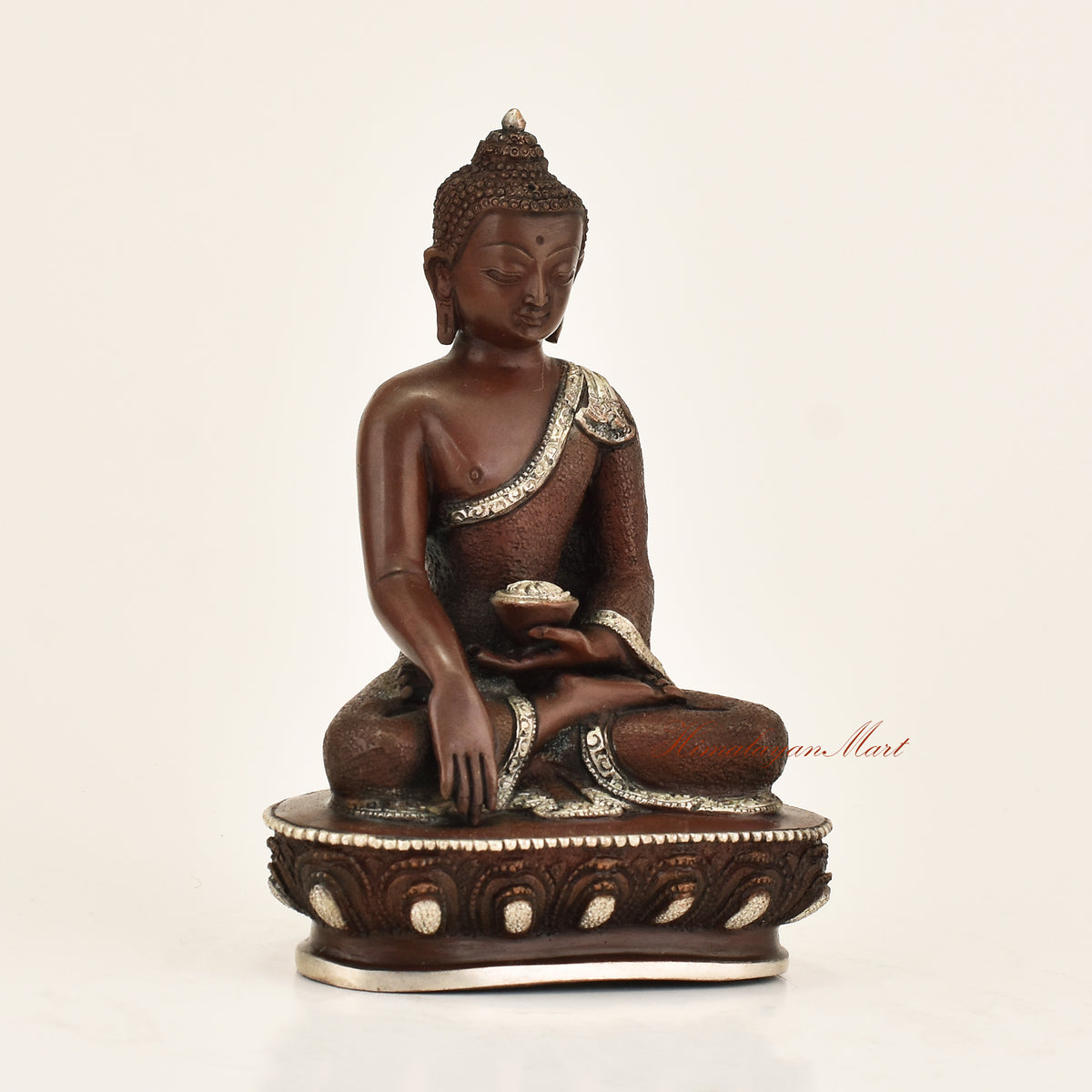 Right side view of Antique Shakyamuni Buddha Statue in copper alloy with oxidized finish