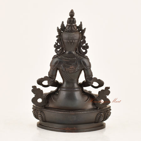 Back view of the Aparimita Statue displaying the detailed lost-wax cast copper alloy finish and traditional Himalayan Buddhist metalwork from Patan, Nepal