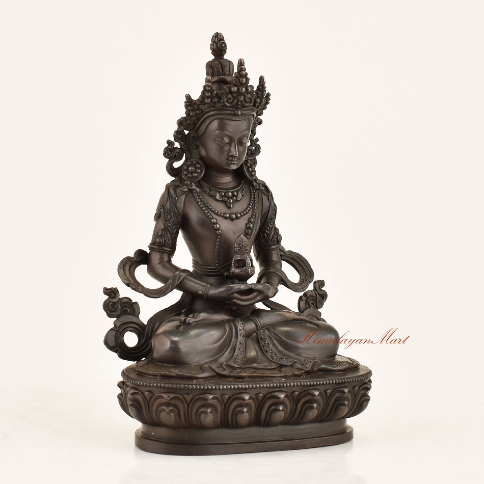 Right side view of the Aparimita Statue showing fine hand-carved detailing, jeweled crown ornaments, and flowing silk garment engravings crafted in Patan, Nepal