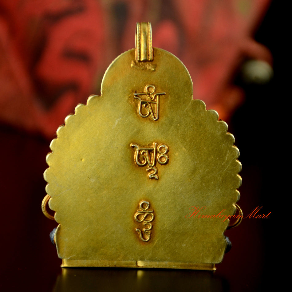 Back view of Aparmita Silver Pendant showing gold plated silver carving on Tibetan Buddhist ghau locket
