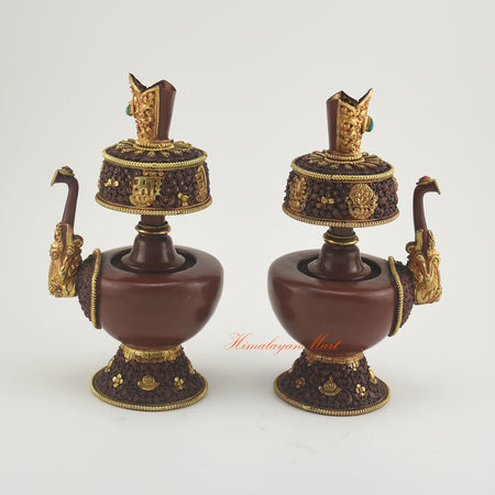 Outward-facing view of Bhumba Ritual Container highlighting hand-carved Buddhist designs and decorative coral and turquoise stones.