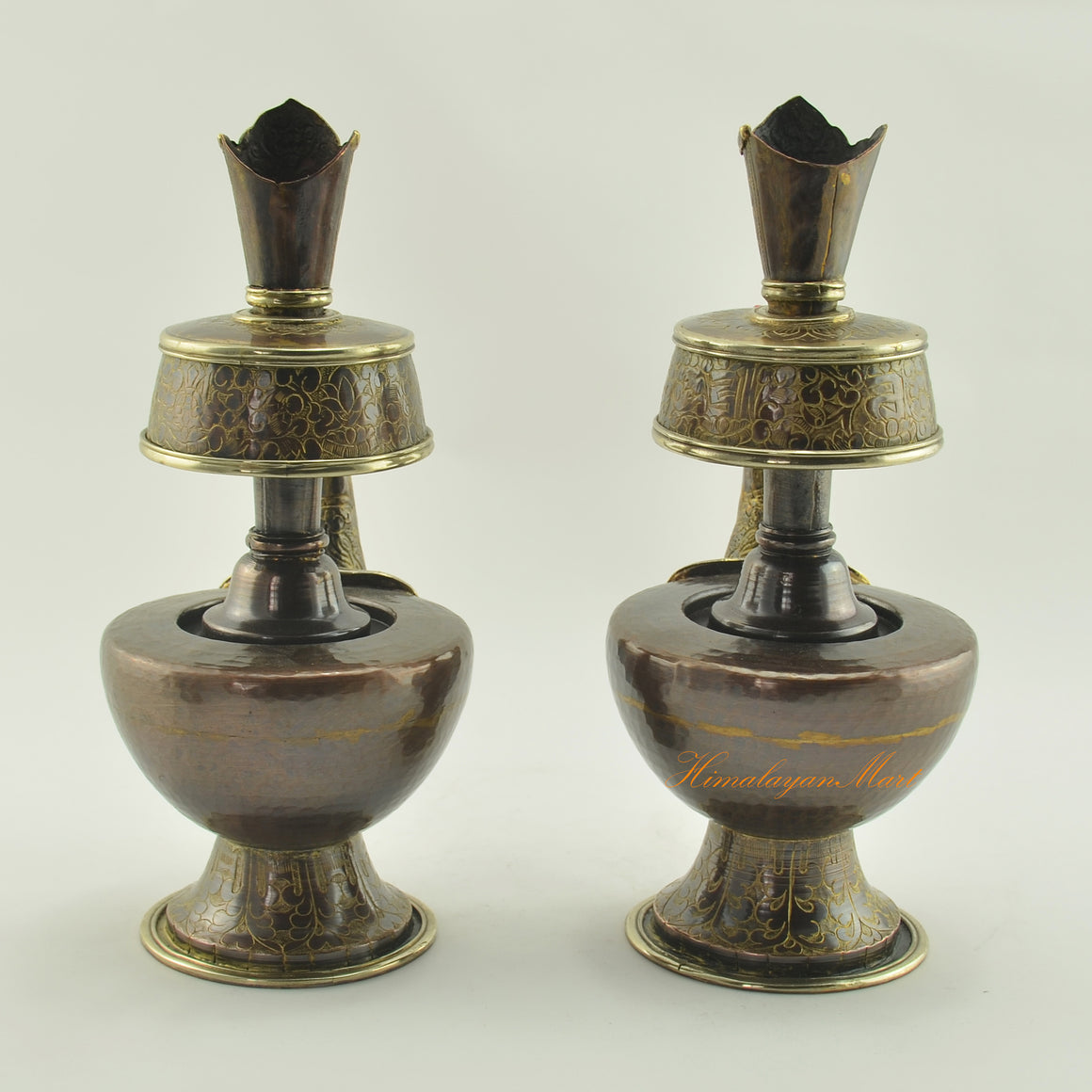 Back view of Bhumba Sacred Ritual Vase highlighting engraved copper alloy surface and intricate Himalayan artisan craftsmanship