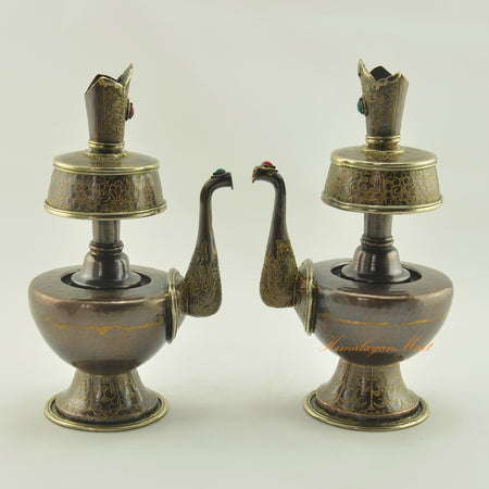 Bhumba Sacred Ritual Vase displayed together, handcrafted Tibetan Buddhist ceremony vessels with brass rings and stone inlays