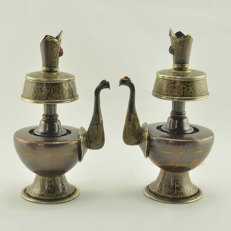 Bhumba Sacred Ritual Vase displayed together, handcrafted Tibetan Buddhist ceremony vessels with brass rings and stone inlays