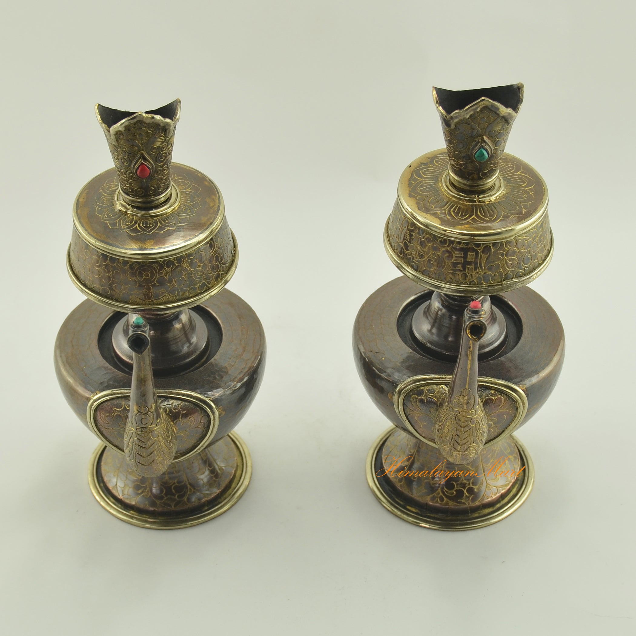 Top view of Bhumba Sacred Ritual Vase showing brass rings and detailed hand carvings with coral and turquoise inlays