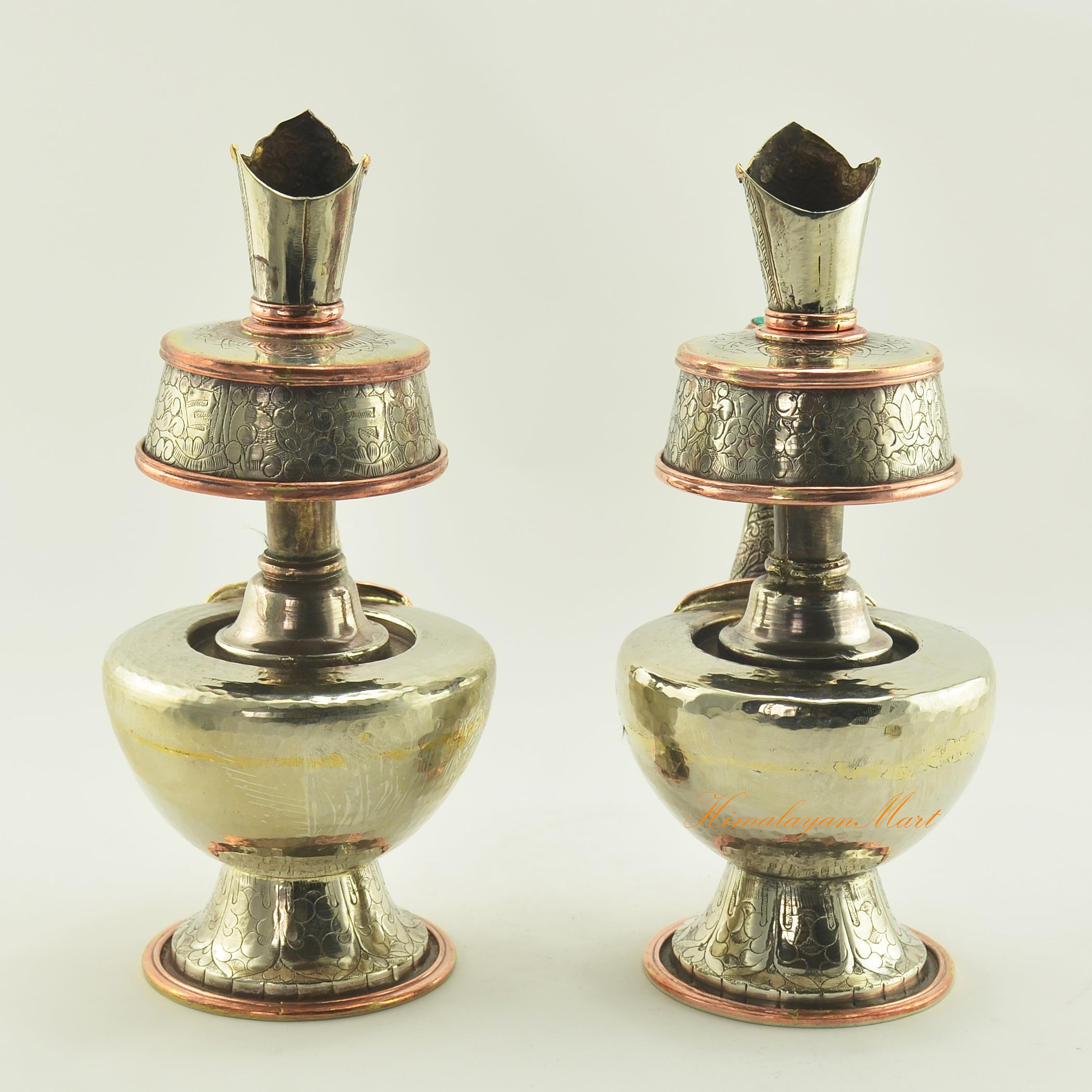Back view of Bhumba Tibetan Ritual Vase showing hand-carved white metal and copper ring details