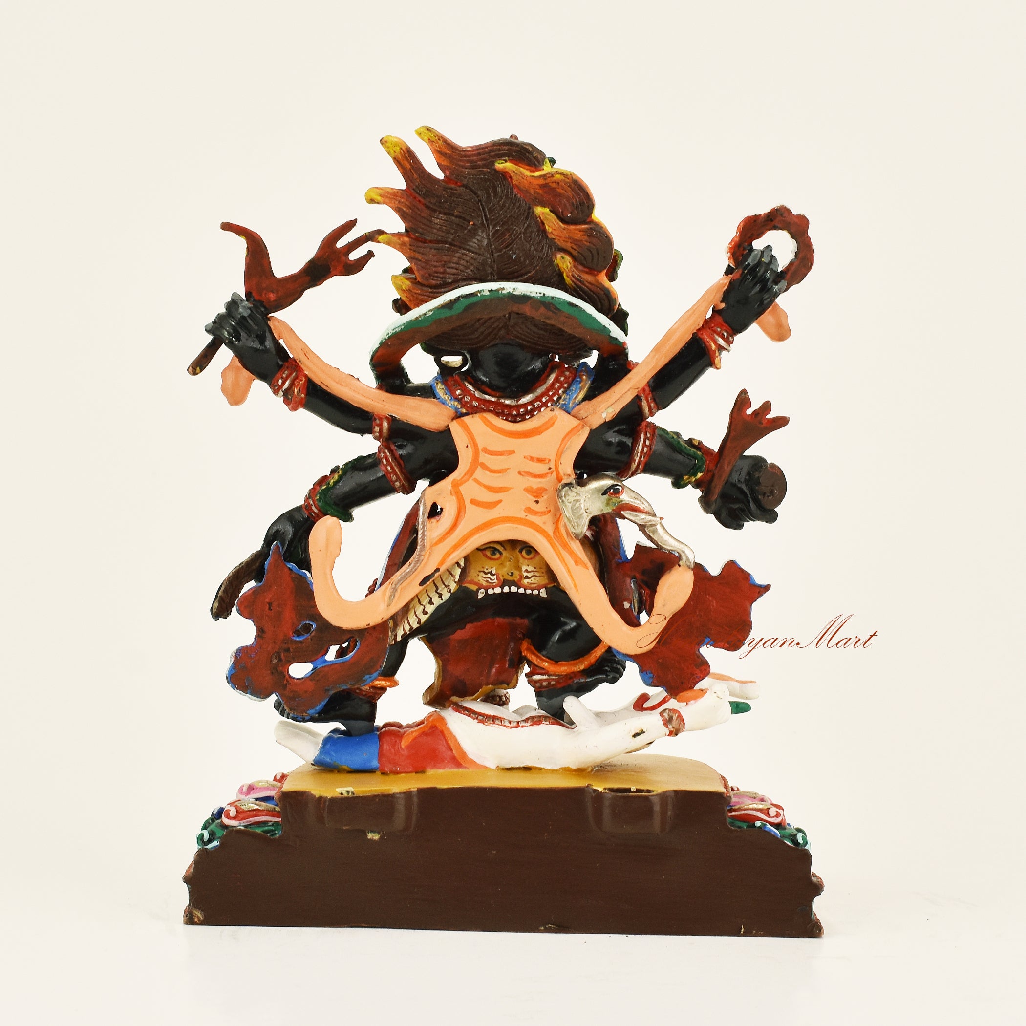 Back view of the Black Mahakala statue without the decorative frame