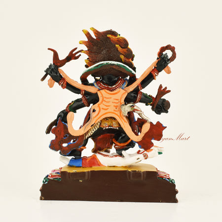 Back view of the Black Mahakala statue without the decorative frame