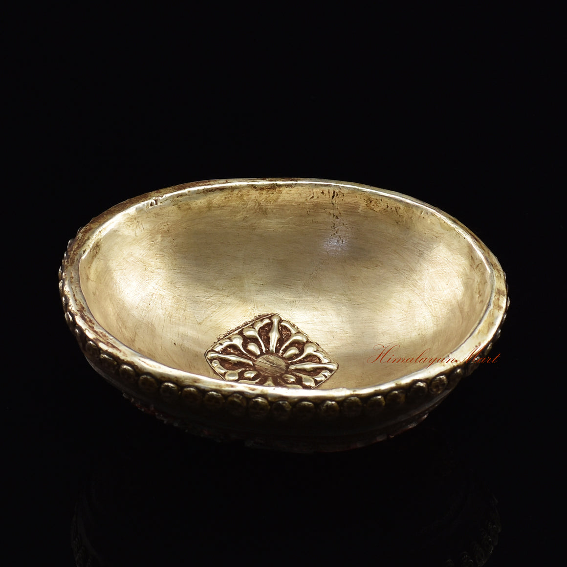 Black Mahakala resin kapala, angled view highlighting Vajrayana-style craftsmanship