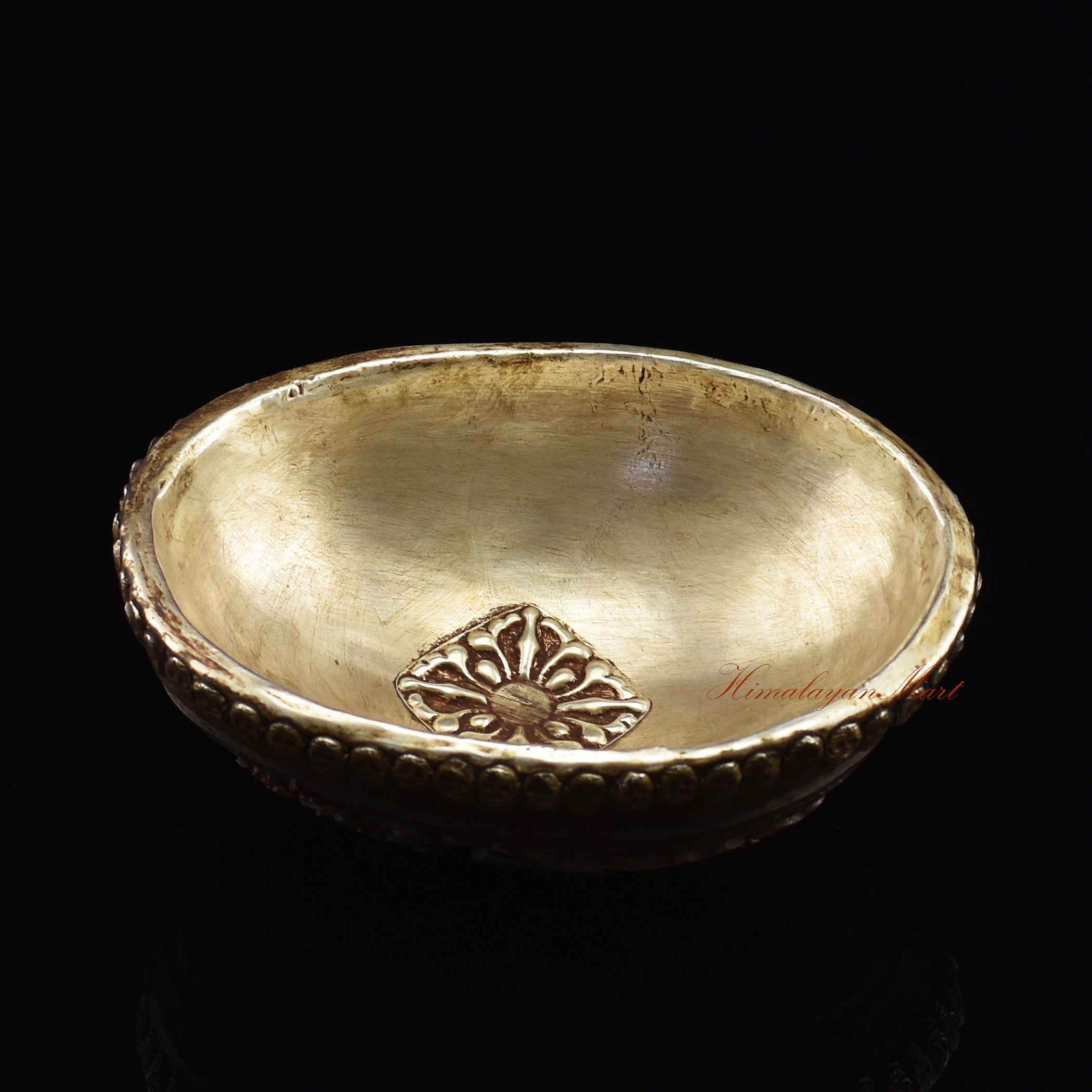 Black Mahakala resin kapala, angled view highlighting Vajrayana-style craftsmanship