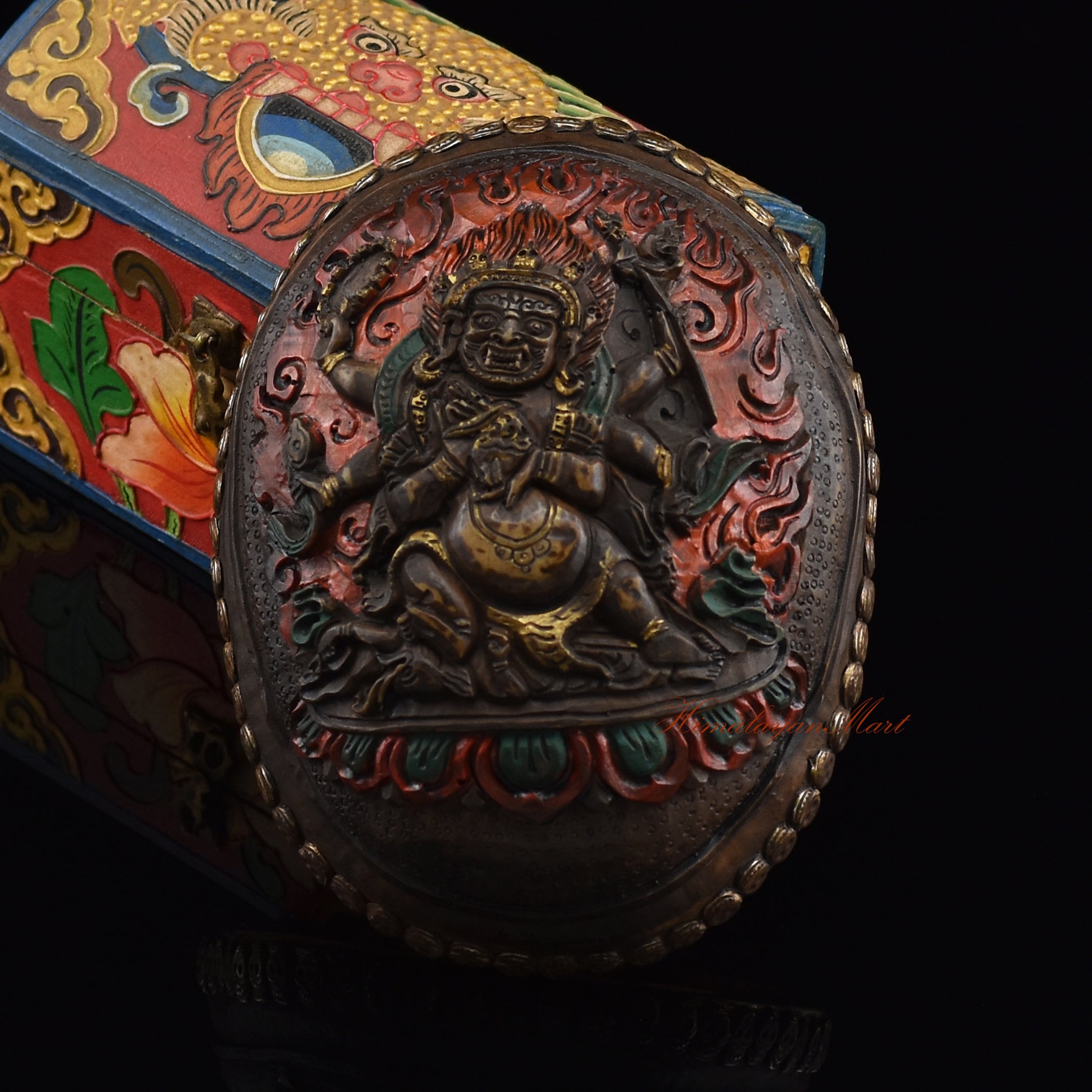 Black Mahakala resin kapala, front view showing detailed skull motifs