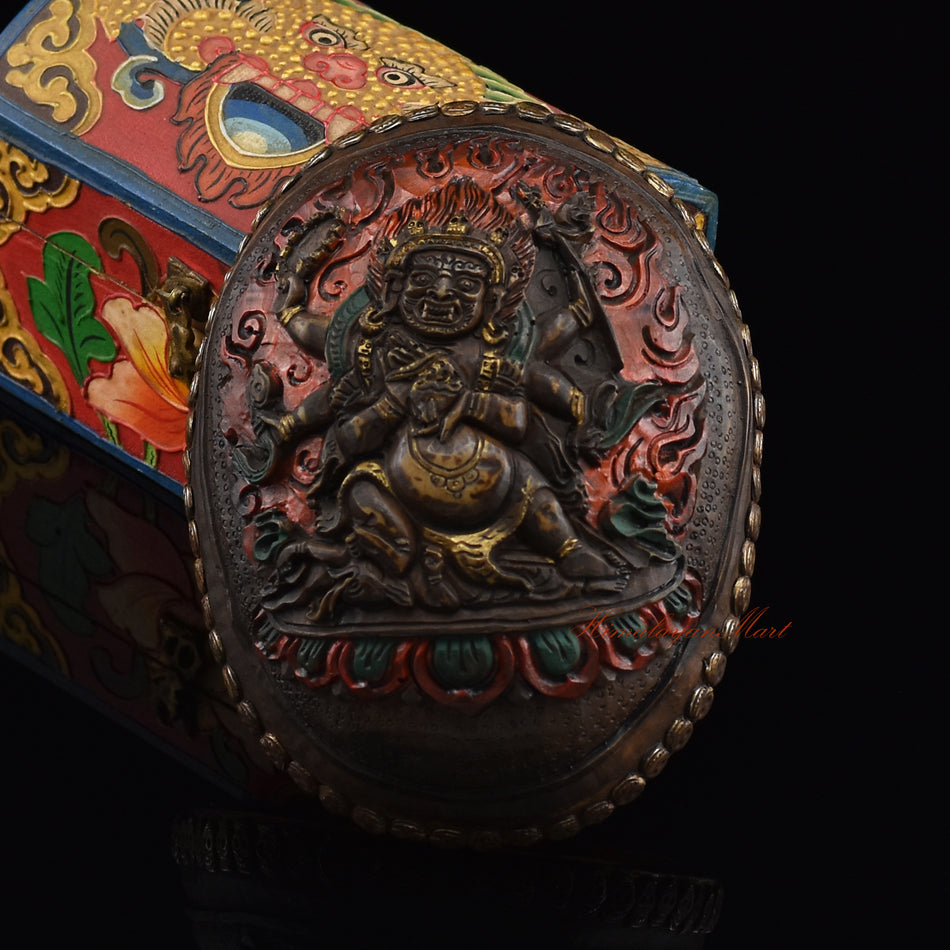 Black Mahakala resin kapala, front view showing detailed skull motifs