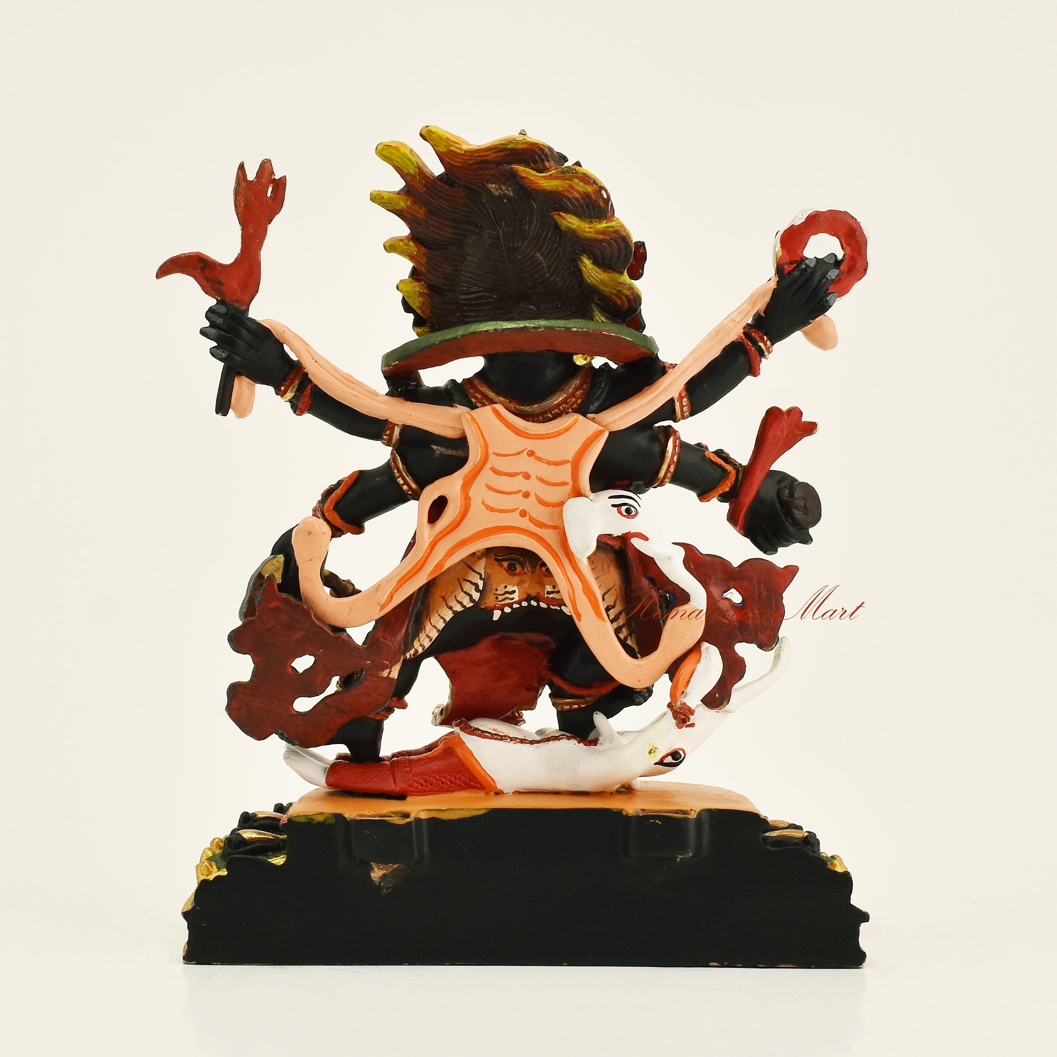 Back view of Black Mahakala statue without frame, showing copper alloy casting and gold gilding detail