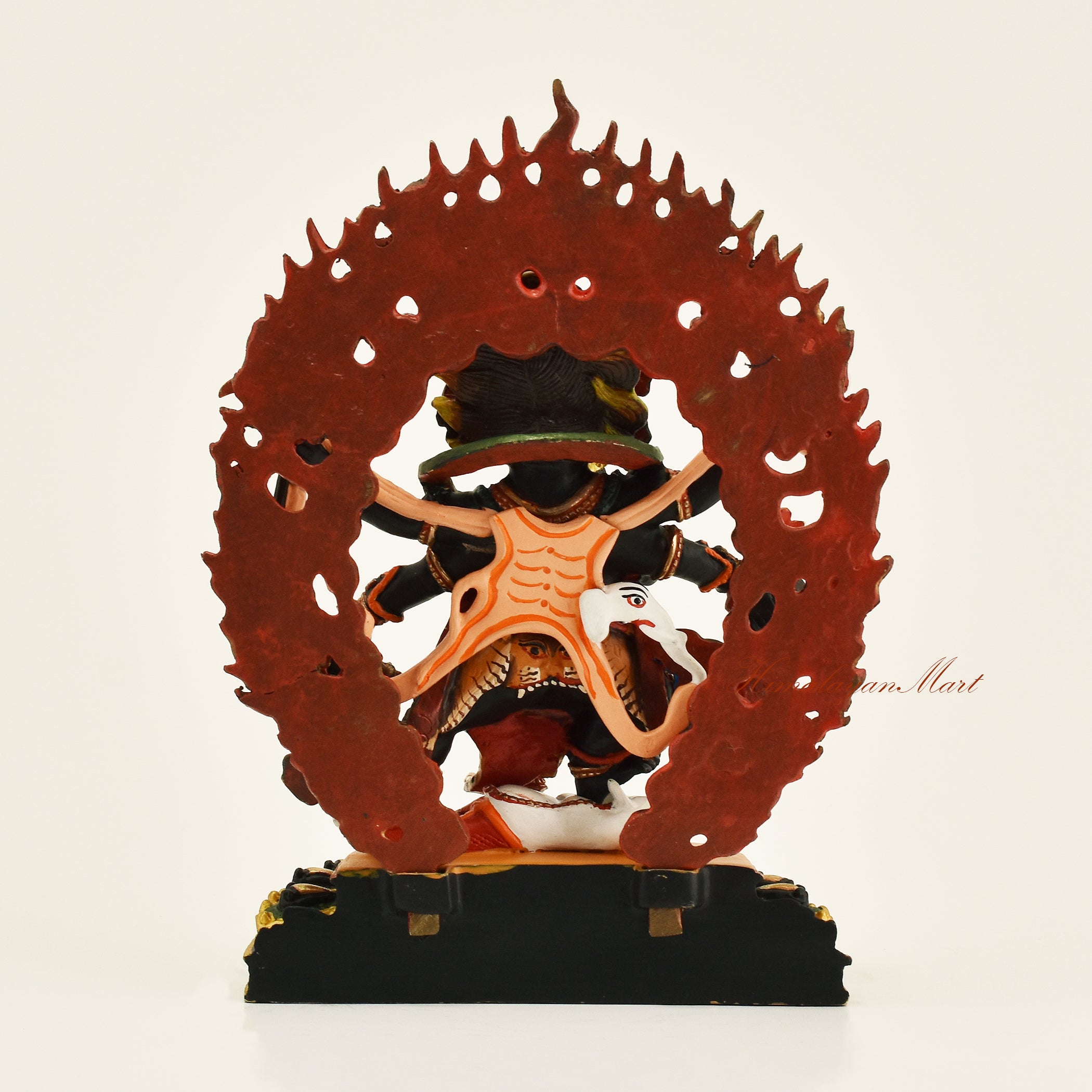 Back view of Black Mahakala statue with wooden frame, handmade in Patan, Nepal