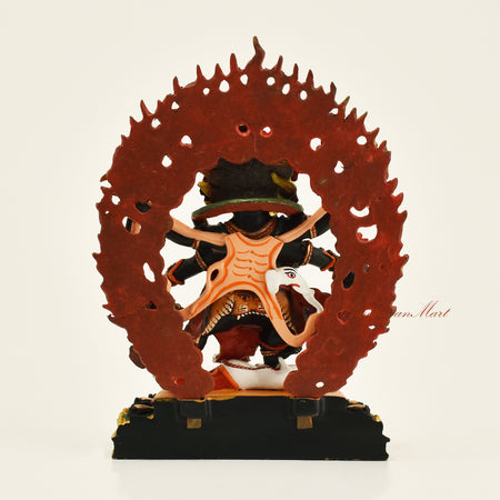 Back view of Black Mahakala statue with wooden frame, handmade in Patan, Nepal