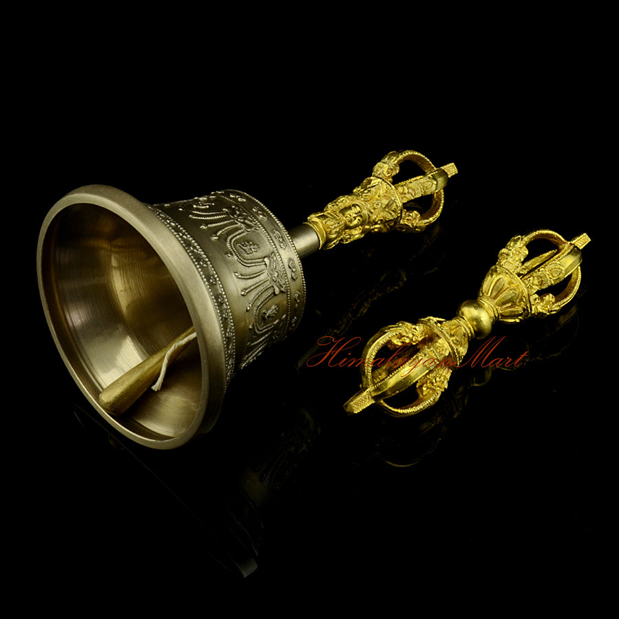 Left side view of bronze Vajra and Bell with mantra engraved detailing