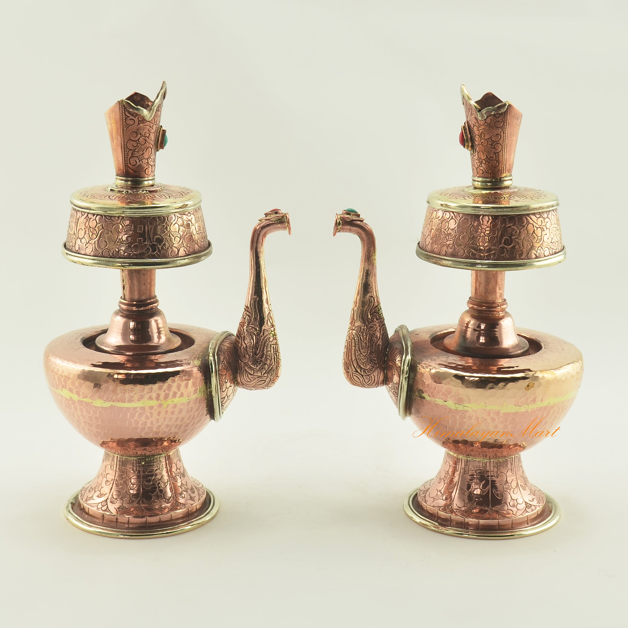 Buddhist Copper Ceremonial Bhumba displayed together, handcrafted ritual offering vessels with brass rings and stone inlay