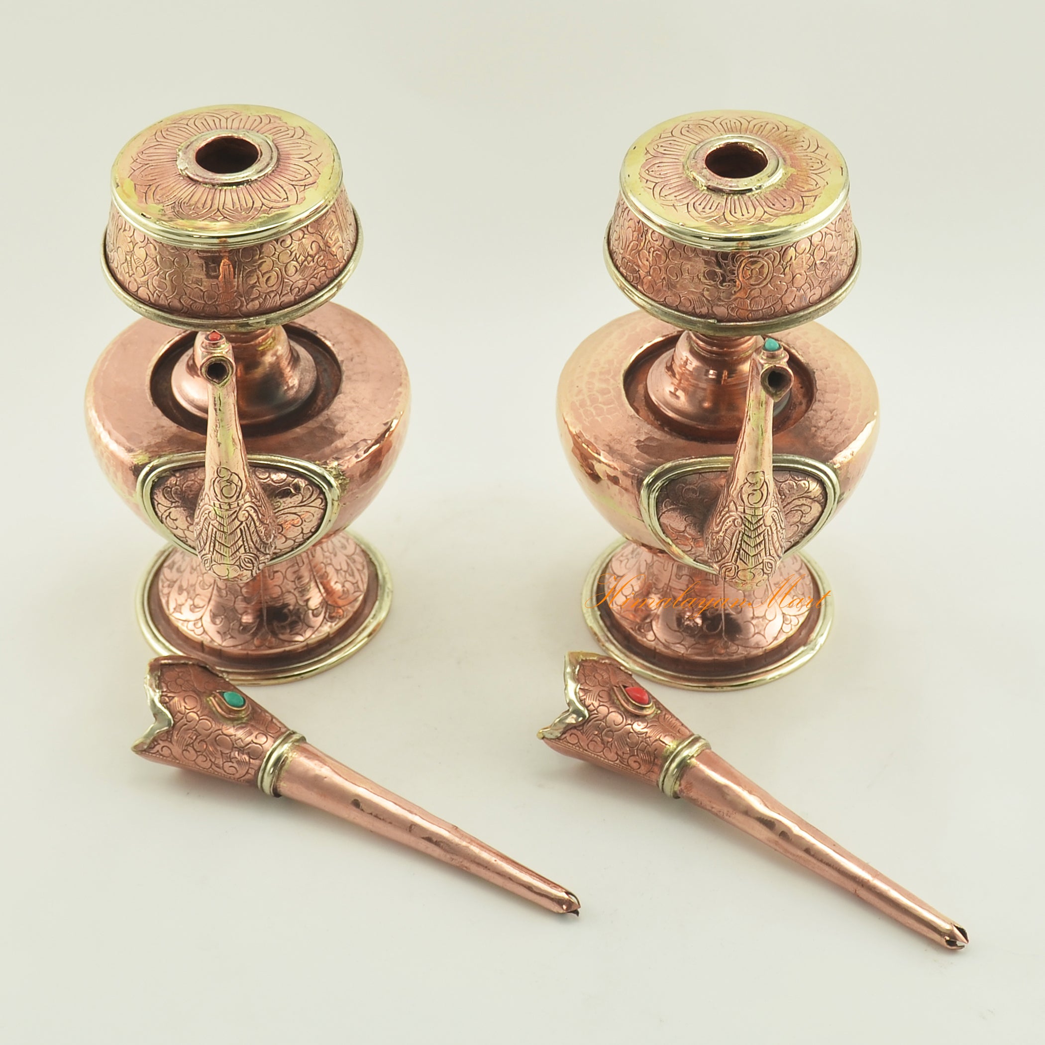 Detail view of Buddhist Copper Ceremonial Bhumba parts featuring coral turquoise stone inlay and fine carving