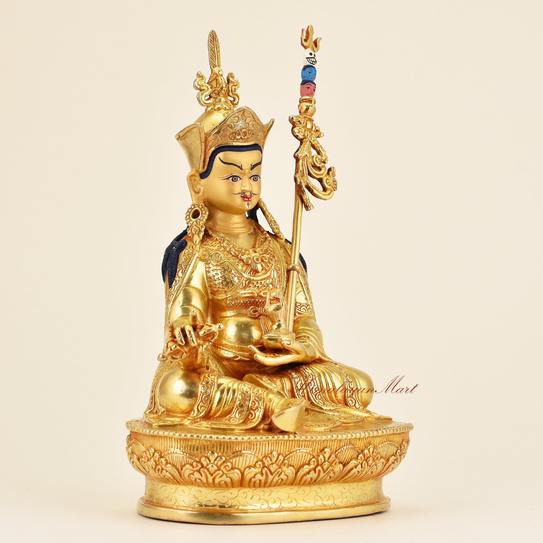 Right-side view of Buddhist Guru Padmasambhava statue in premium gold gilded finish, showcasing fine hand-carved details and sacred artisan work.