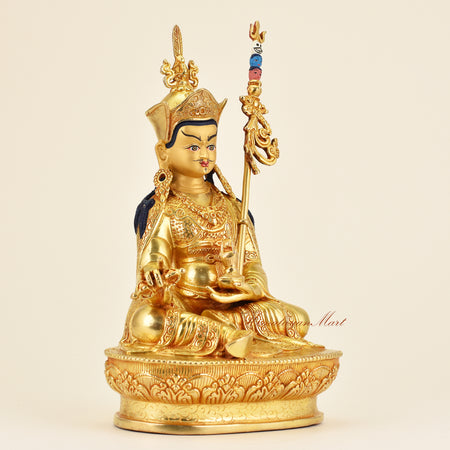 Right-side view of Buddhist Guru Padmasambhava statue in premium gold gilded finish, showcasing fine hand-carved details and sacred artisan work.