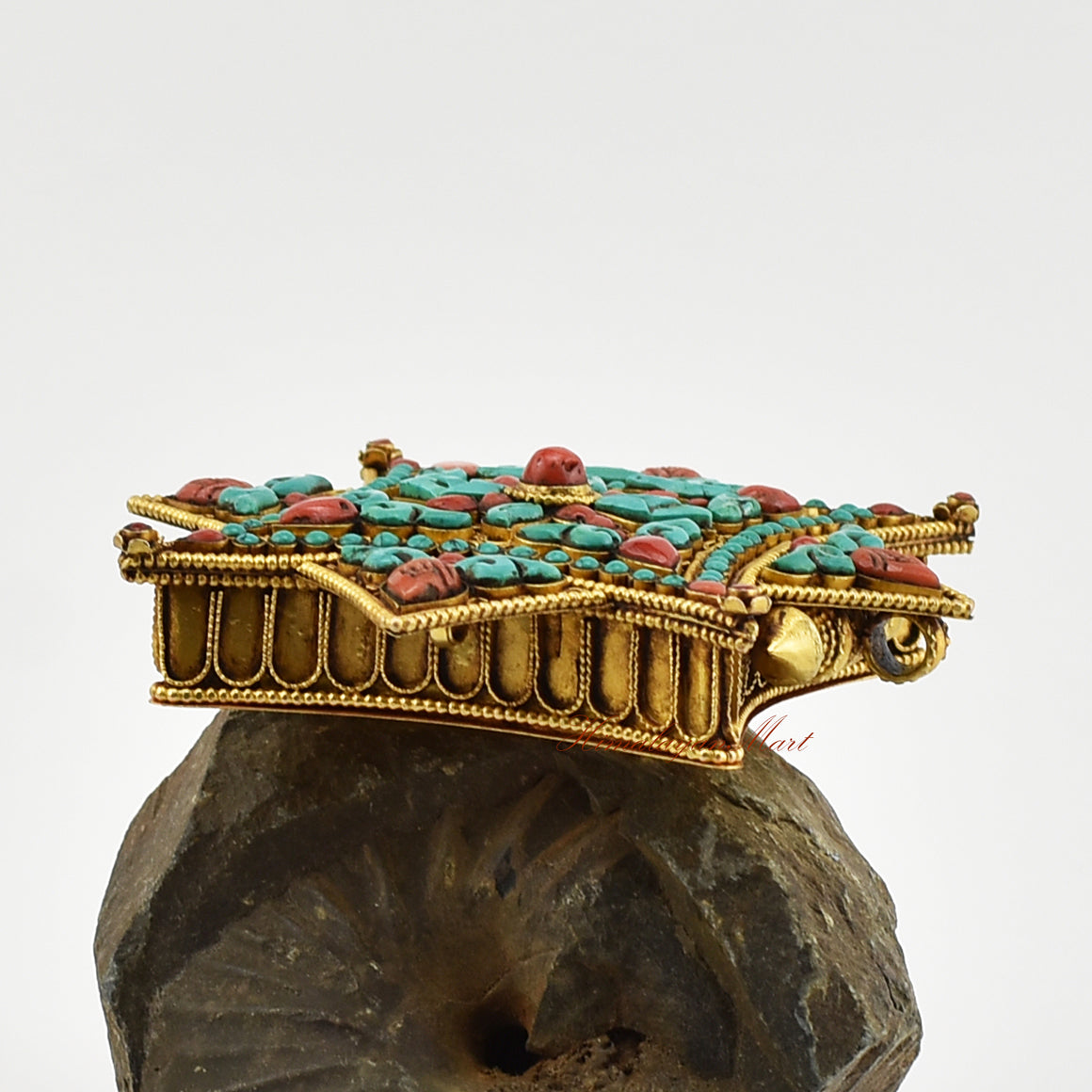 Right-side view of the Buddhist Religious Prayer Box Pendant showing detailed filigree work and coral and turquoise embellishments.