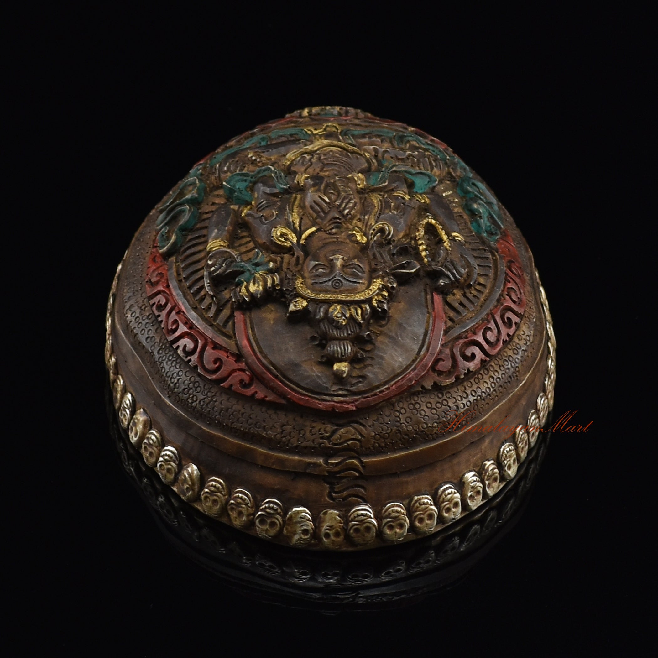 Chenrezig carved resin kapala, top view showing kapala design