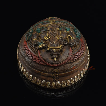 Chenrezig carved resin kapala, top view showing kapala design
