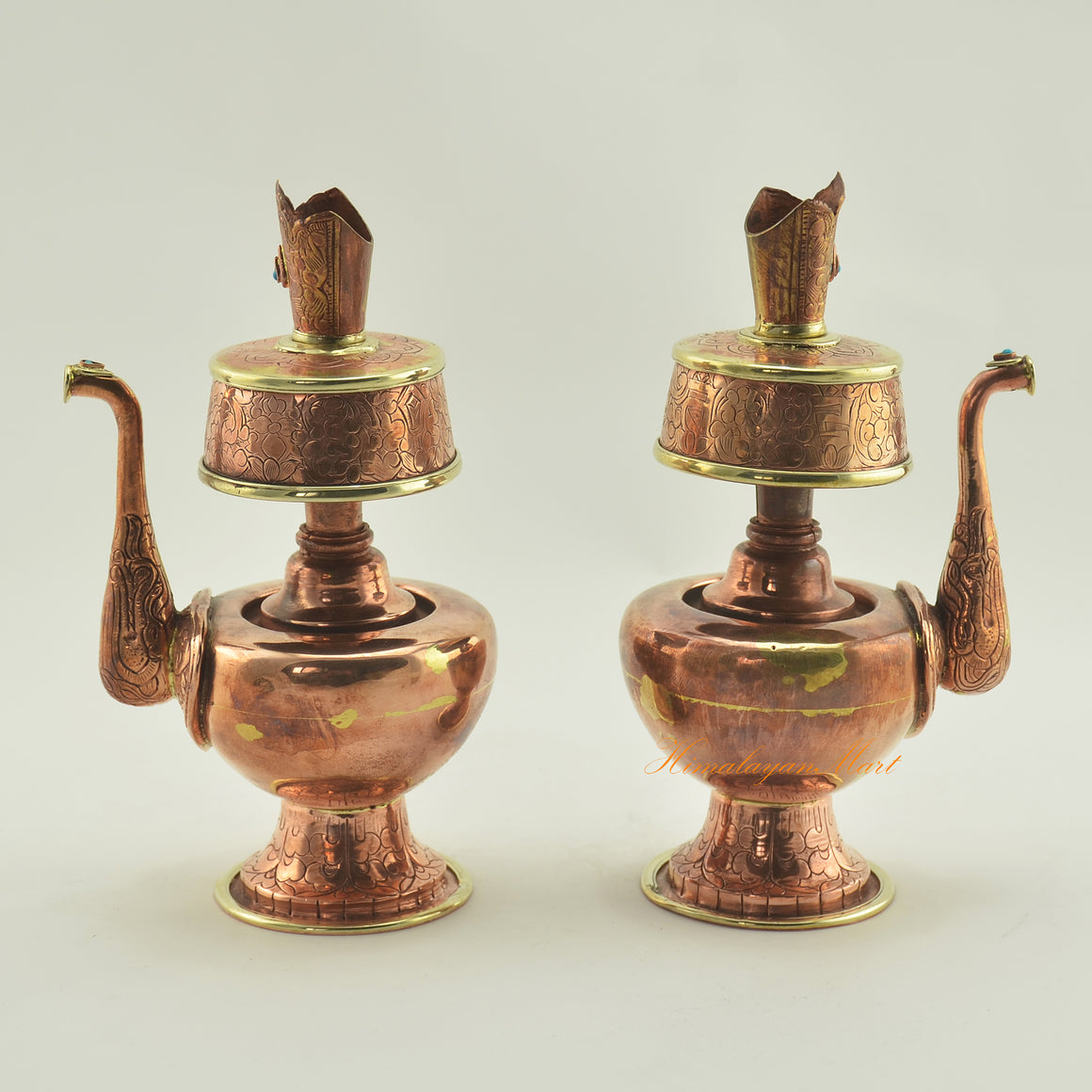Left and right view of Copper Bhumba Offering Set showing hand-carved copper alloy ritual vessels