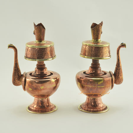 Left and right view of Copper Bhumba Offering Set showing hand-carved copper alloy ritual vessels