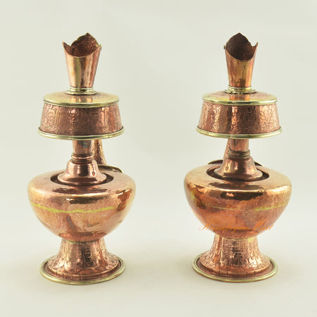 Back view of Copper Bhumpa Vase highlighting traditional hand-carved copper alloy ritual design