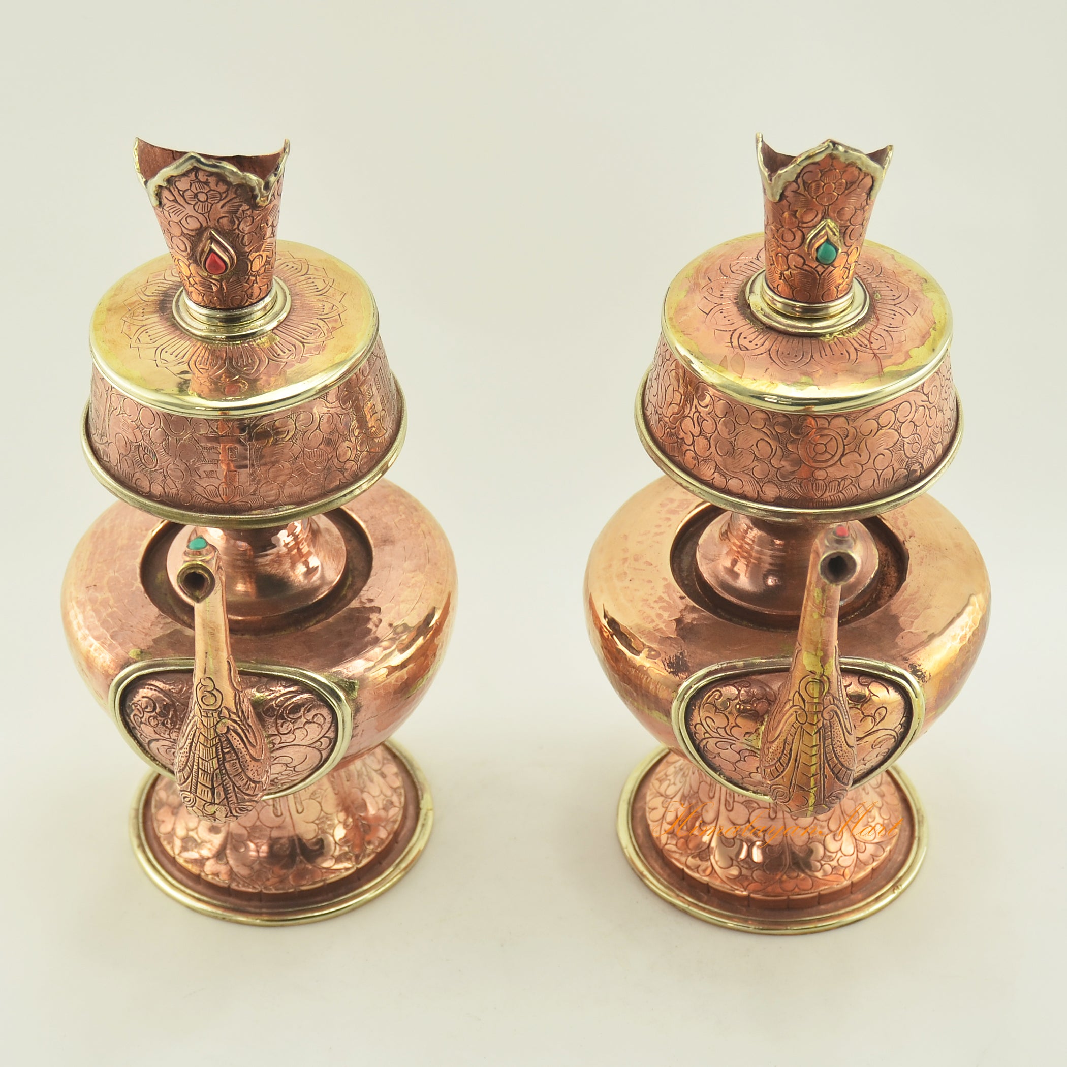 Top view of Copper Bhumpa Vase showing upper rim, brass ring accents, and carved copper surface