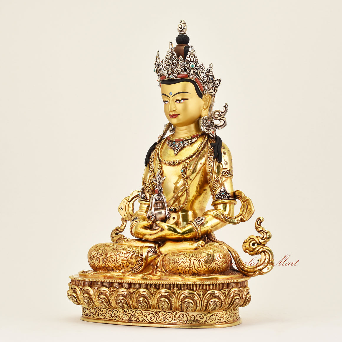 Left-side view of the Crowned Amitayus statue, highlighting balanced form, intricate details, and traditional Buddhist sacred art craftsmanship.