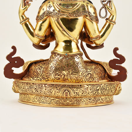 Close-up of the back detail of the Crowned Chenrezig statue, emphasizing intricate carving, flowing robes, and meticulous handcrafted craftsmanship.
