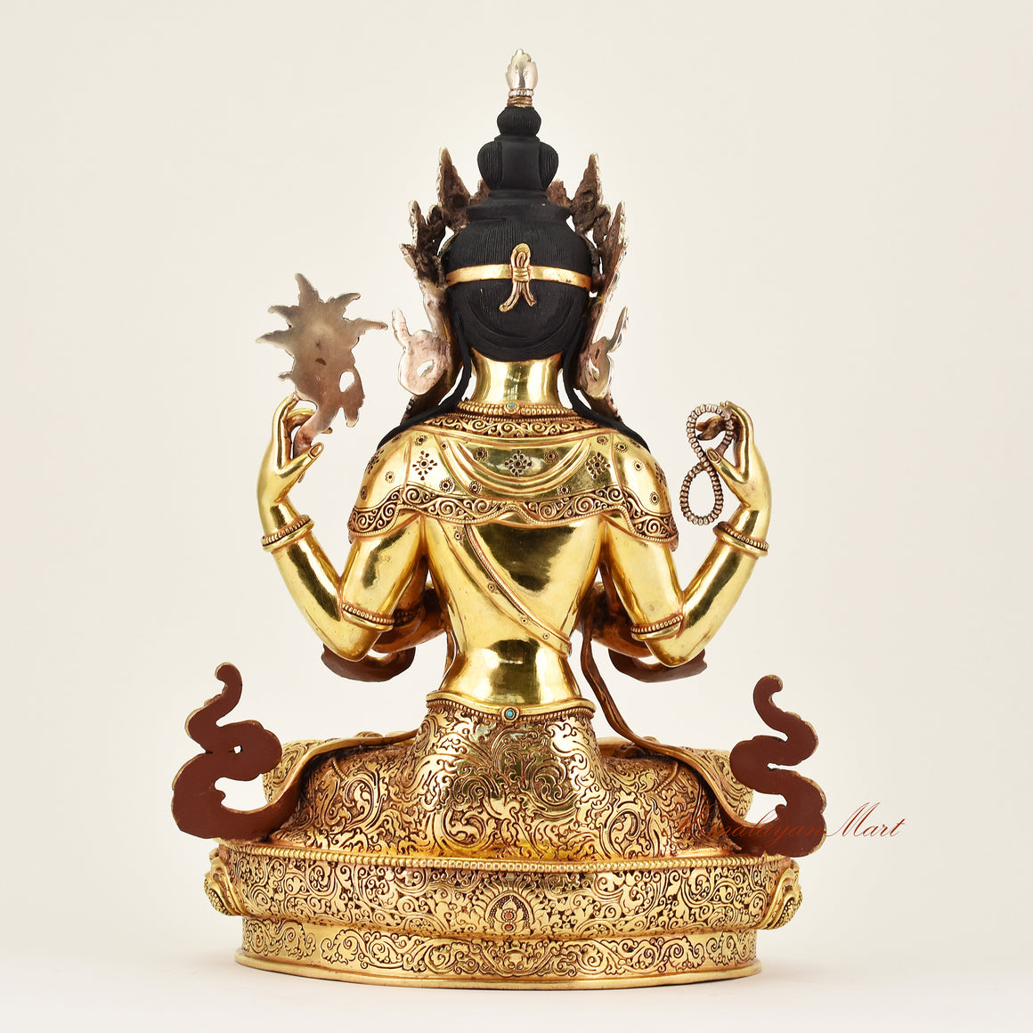 Back view of a handcrafted Crowned Chenrezig statue, revealing detailed robes and fine Buddhist sculptural artistry.