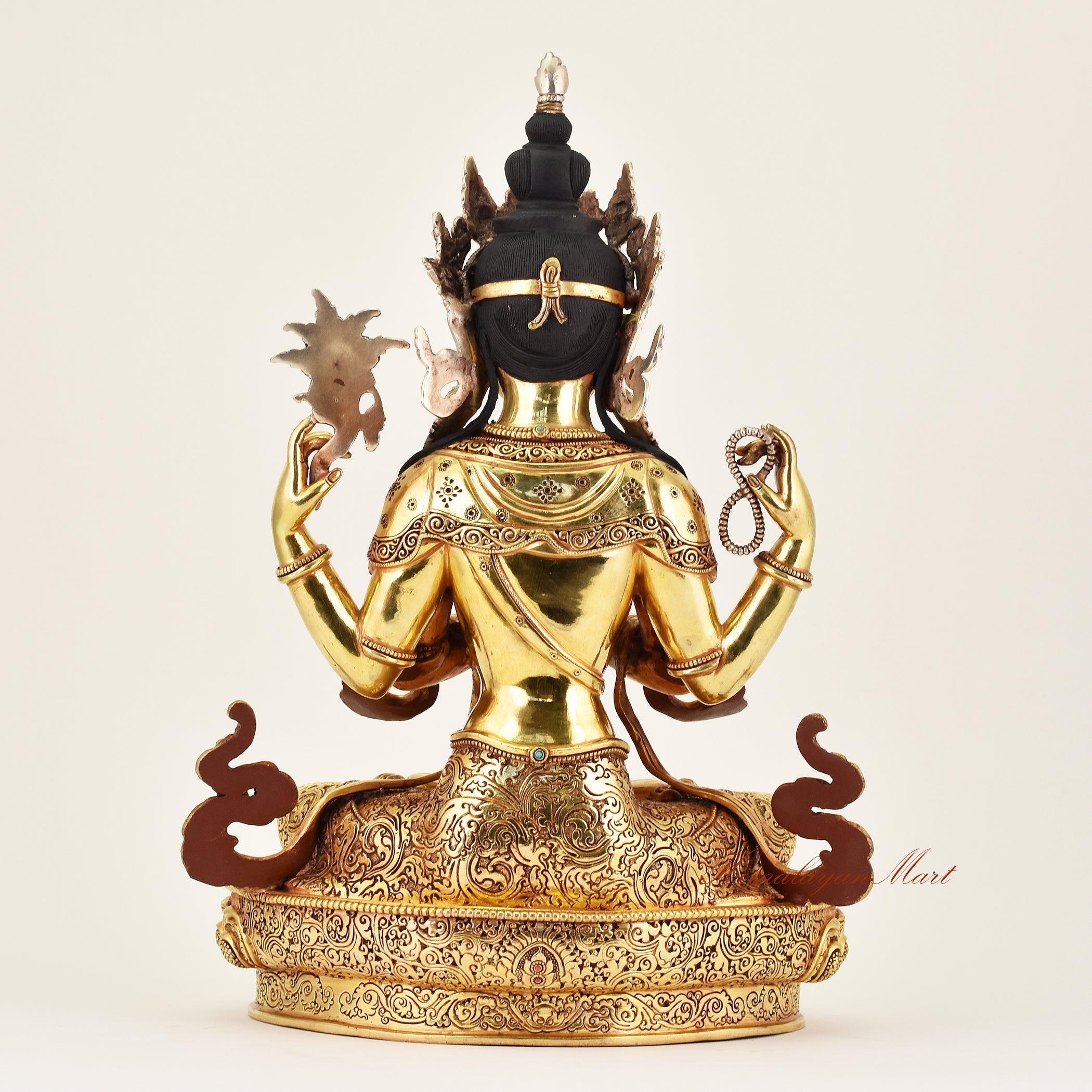 Back view of a handcrafted Crowned Chenrezig statue, revealing detailed robes and fine Buddhist sculptural artistry.