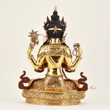 Back view of a handcrafted Crowned Chenrezig statue, revealing detailed robes and fine Buddhist sculptural artistry.