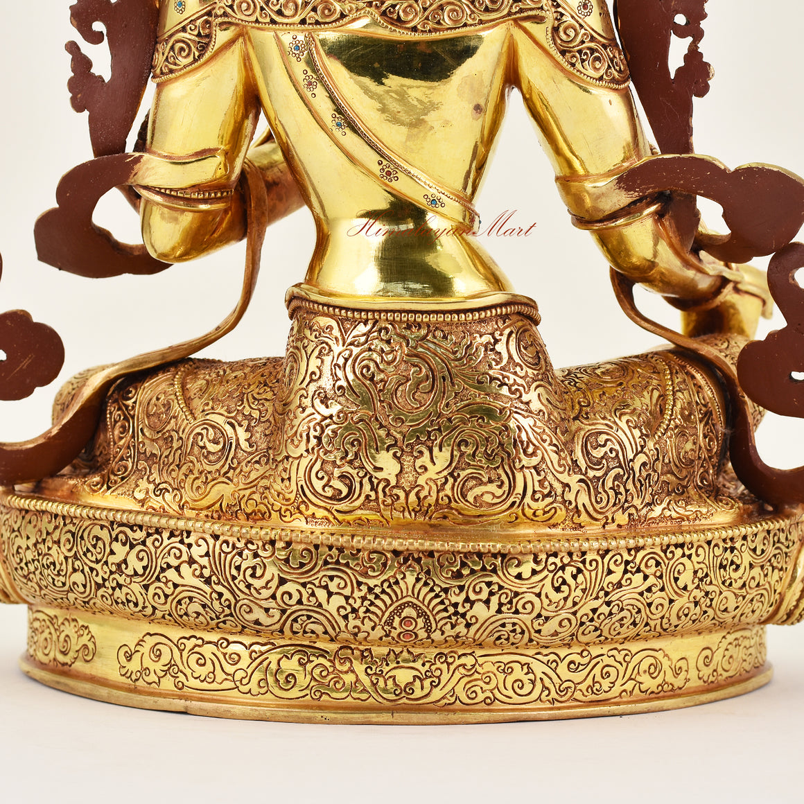 Close-up of the back detail of the Crowned Green Tara statue, emphasizing meticulous craftsmanship, ornamental details, and sacred Buddhist artistry.