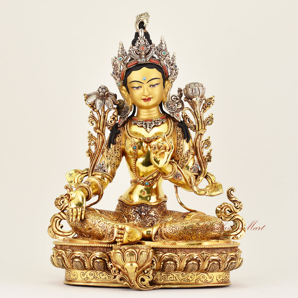 Crowned Green Tara statue representing protection and compassion, handcrafted Buddhist sacred art ideal for meditation, altar, and spiritual spaces.
