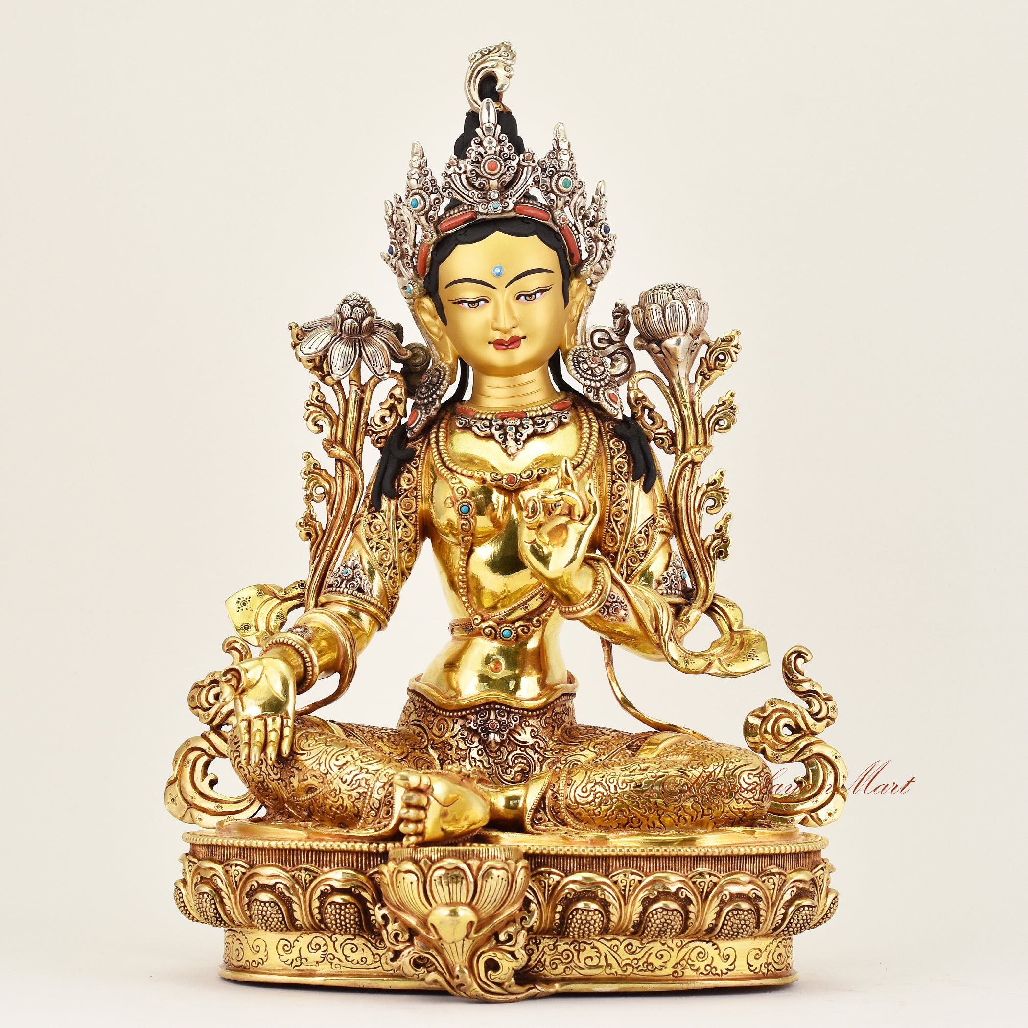 Crowned Green Tara statue representing protection and compassion, handcrafted Buddhist sacred art ideal for meditation, altar, and spiritual spaces.