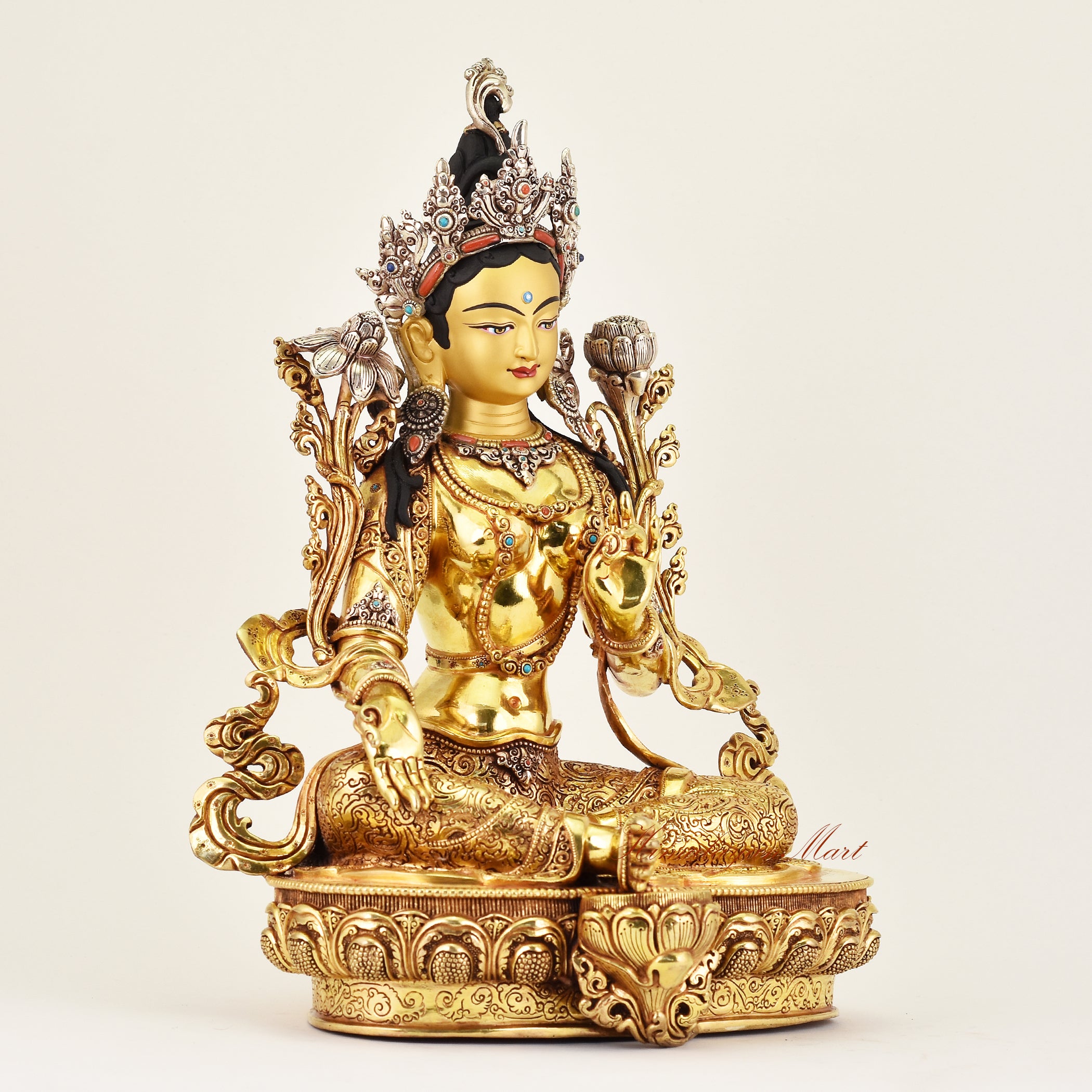 Right-side view of a Crowned Green Tara statue, showcasing intricate craftsmanship and symbolic Buddhist artistry emphasizing compassion and protection.