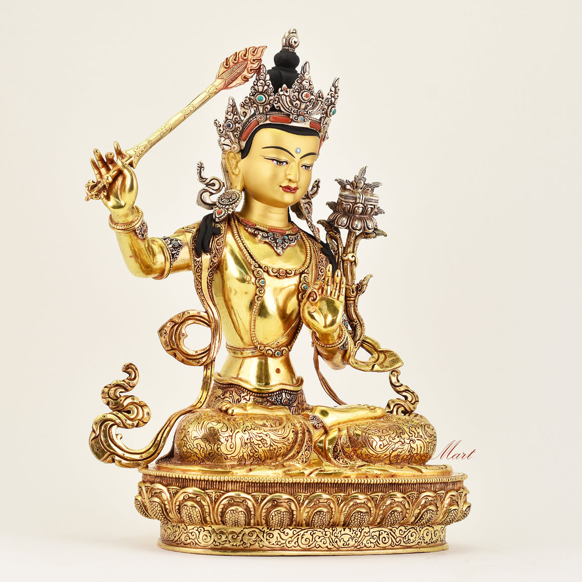 Right-side view of a Crowned Manjushri statue, highlighting detailed craftsmanship and symbolic Buddhist features emphasizing wisdom and insight.