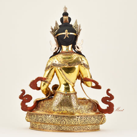 Back view of a handcrafted Crowned Vajrasattva statue, revealing detailed robes and fine Buddhist sculptural workmanship.