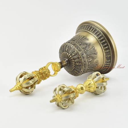 Angled left view of gold-plated Tibetan Dorje and Drilbu Set showing bell and vajra proportions